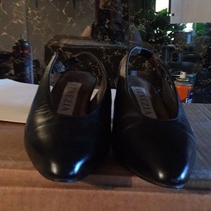 Black dress shoes 1 1/2 inch heal.